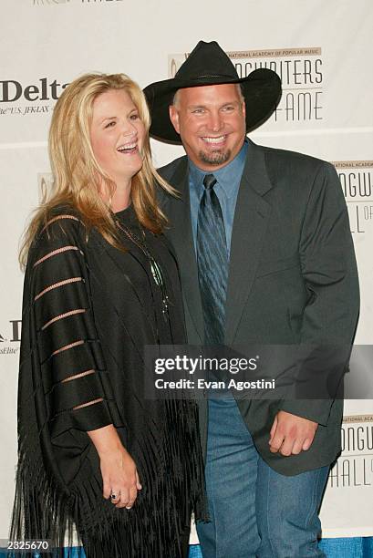 Singer Trisha Yearwood with boyfriend Garth Brooks who received The Hitmaker Award at the 33rd Annual Songwriters Hall Of Fame Awards induction...