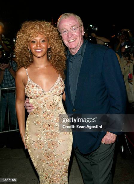 Beyonce Knowles and Michael Caine posing together at the "Austin Powers In Goldmember" post screening party at Barneys New York in New York City....