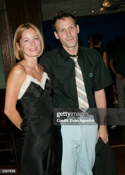 Host Marlon Richards with wife Lucie De La Falaise at the "MOONAGE DAYDREAM: The Life and Times of Ziggy Stardust" book party at The National Arts...