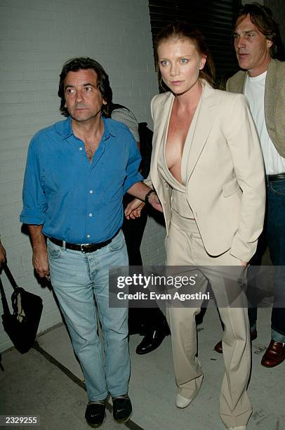 Griffin Dunne with actress Peta Wilson arriving at the "Igby Goes Down" premiere after-party at Splashlight Studios in New York City. September 4,...