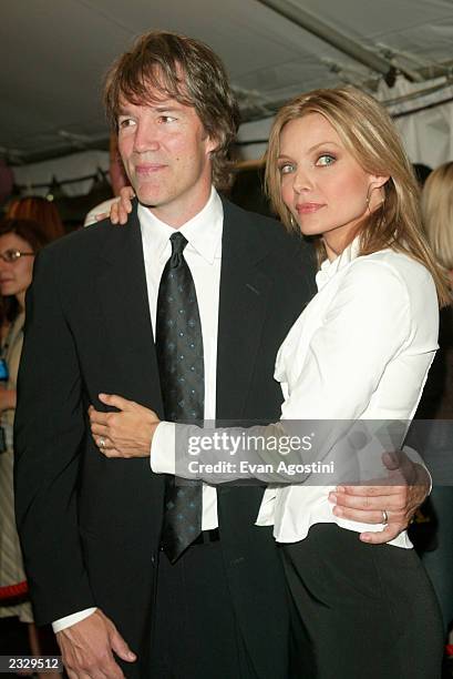 Actress Michelle Pfeiffer with husband David E. Kelley arriving at the "White Oleander" film premiere during The Toronto International Film Festival...