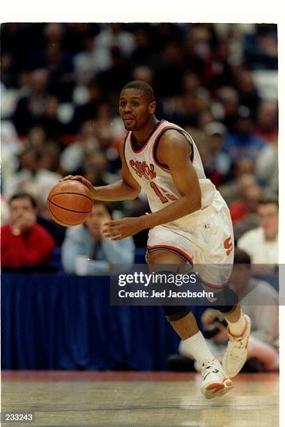 SYRACUSE ORANGEMEN GUARD ADRIAN AUTRY DRIBBLES DOWN COURT DURING A BIG EAST CONFERENCE GAME WITH THE ST. JOHN''S REDMEN.