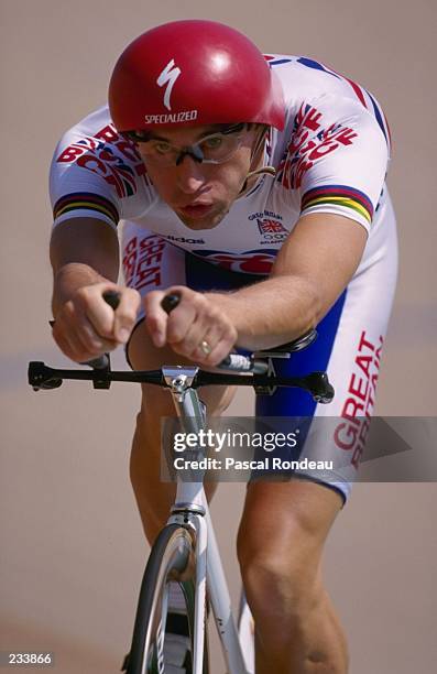 Graeme Obree of Great Britain in action in the individual pursuit qualifiers at Stone Mountain Velodrome at the 1996 centennial Olympic games in...