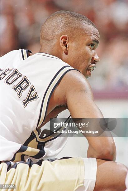 Stephon Marbury of the Georgia Tech Yellow Jackets rests on the sideline during the Yellow Jackets 84-79 ACC Tournament Semifinal victory over the...