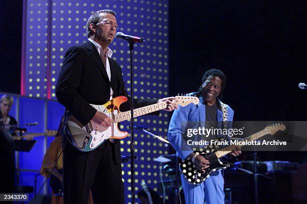 Eric Clapton with Buddy Guy onstage performing at The Concert for New York City to benefit the victims of the World Trade Center disaster at Madison...