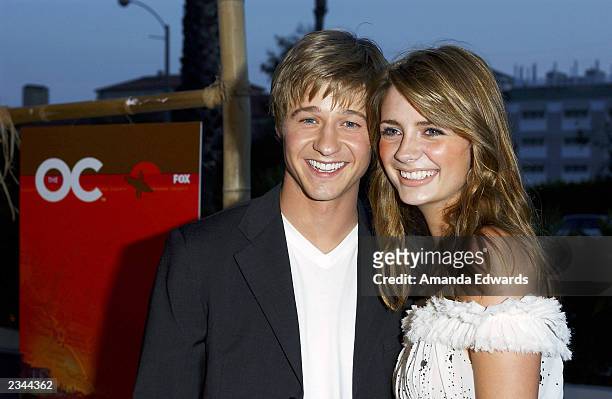 Actors Benjamin McKenzie and Mischa Barton arrive at "The O.C." kickoff party at the Viceroy on July 29, 2003 in Santa Monica, California.