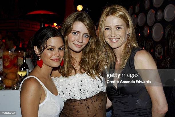 Actresses and co-stars Rachel Bilson, Mischa Barton and Kelly Rowan pose at "The O.C." kickoff party at the Viceroy on July 29, 2003 in Santa Monica,...