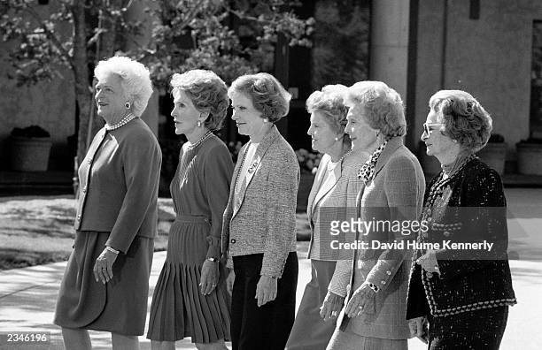First Ladies Barbara Bush, Nancy Reagan, Rosalynn Carter, Betty Ford, Pat Nixon, and Lady Bird Johnson attend former President Ronald Reagan's...