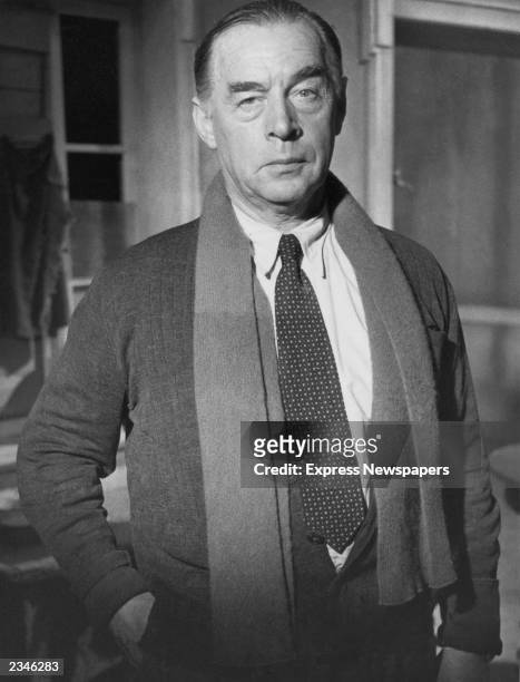 German writer Erich Maria Remarque , author of 'All Quiet On The Western Front,' stands on the set of the film, 'A Time To Love And A Time To Die,'...