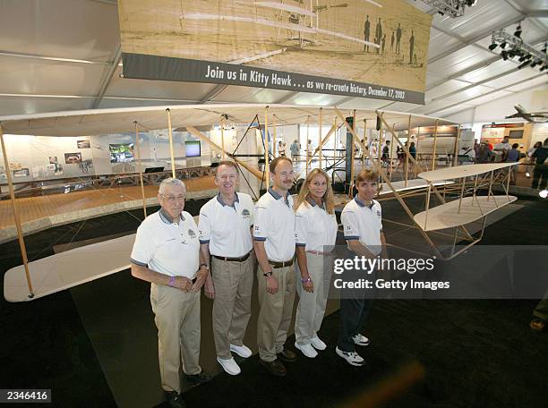 In this image provided by the Experimental Aircraft Association , test pilot Scott Crossfield stands with pilots he trained Ken Hyde, Kevin...