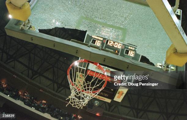 Darvin Ham of the Texas Tech Red Raiders halted the NCAA East Regional Tournament game in the first half with a backboard shattering dunk at the...