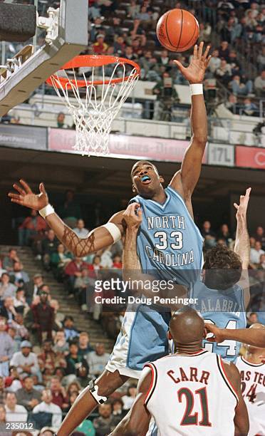 Antawn Jamison of the North Carolina Tar Heels jumps to tip in a shot during the Tar Heels 92-73 NCAA East Regional Tournament loss to the Texas Tech...