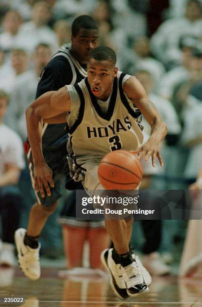 Allen Iverson moves the ball upcourt as his 35 points lead the Georgetown Hoyas to a 106-68 defeat of the Villanova Wildcats in their Big East finale...