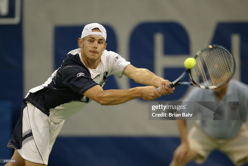 Andy Roderick Serving Andy Roddick of the USA stretches out to get a serve from Gregory ...