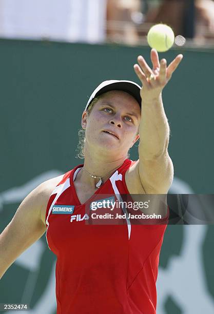 Kim Clijsters of Belgium serves against Marie-Gaianeh Mikaelian of Switzerland during the quaterfinals of the Bank of the West Classic at Stanford...