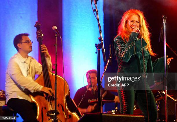 Chris Minh Doky and Danish singer Sanne Salomonsen perform in Tivoli Garden in the City of Copenhagen, 05 July 2003 on the eve of the 25th annual...