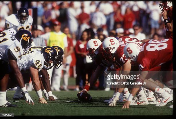 THE STANFORD OFFENSIVE LINE AND CAL DEFENSIVE LINE SET AT THE LINE OF SCRIMMAGE DURING THE GOLDEN BEARS 46-17 ROMP OVER THE CARDINAL.