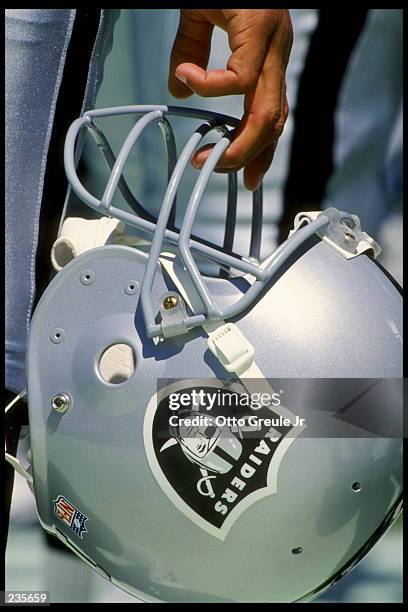 Tight portrait of an Oakland Raiders helmet while standing on the sideline during the Raiders 27-22 victory over the St. Louis Rams at the Oakland...