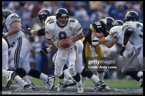 Quarterback Mark Brunell of the Jacksonville Jaguars looks to hand the football off during the Jaguars 20-16 win over the Pittsburgh Steelers at the...