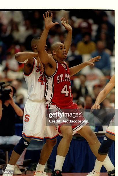 ST. JOHN''S CENTER SHAWNELLE SCOTT POSTS UP INSIDE AGAINST THE SYRACUSE ORANGEMEN DURING A BIG EAST CONFERENCE GAME