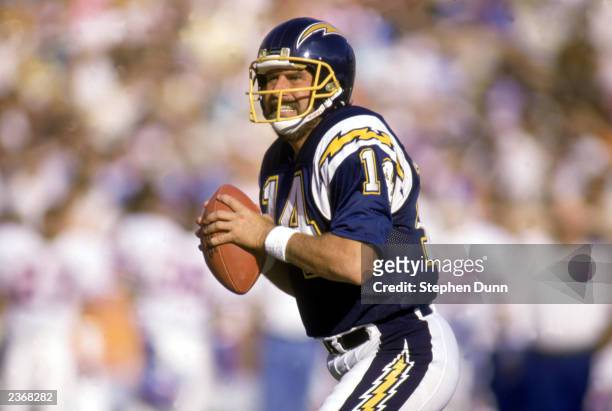 Quarterback Dan Fouts of the San Diego Chargers looks to pass during a 1987 NFL game.