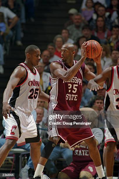 Center Eric Dampier of Mississippi State backs in to a Cincinnati defensemen during the Bulldogs 73-63 win over Cincinnati at the Rupp Arena in...