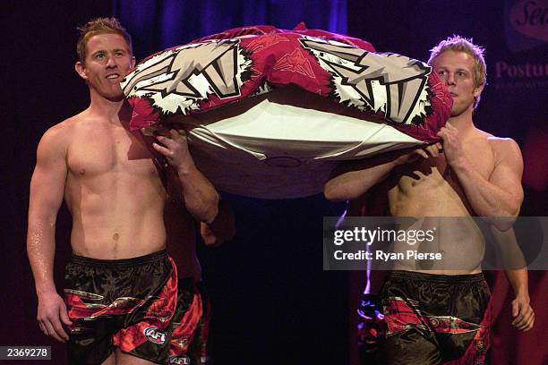 Essendon footballers Jason Johnson and Mark Johnson on the catwalk during the Essendon Football Club Fashion Show August 5, 2003 at The Grand Hyatt...