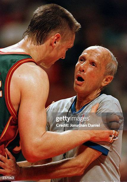 Detlef Schrempf of the Seattle SuperSonics argues with referee Dick Bavetta during third quarter action in game six of the 1996 NBA finals at the...