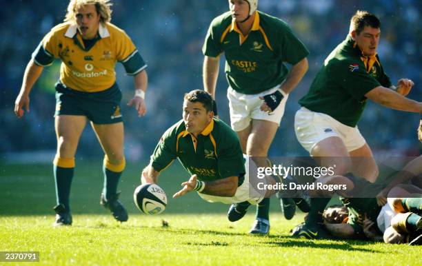 Joost Van Der Westhuizen of South Africa passes the ball during the Tri-Nations match between South Africa and Australia held on July 12, 2003 at the...