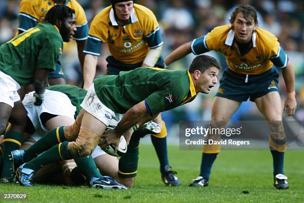 Joost Van Der Westhuizen of South Africa passes the ball during the Tri-Nations match between South Africa and Australia held on July 12, 2003 at the...