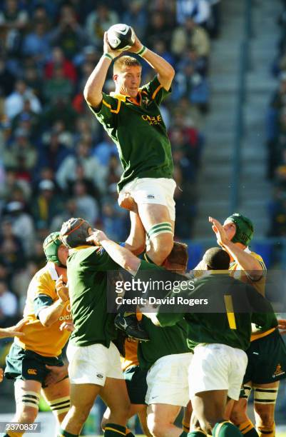 Bakkies Botha of South Africa rises highest at the line-out during the Tri-Nations match between South Africa and Australia held on July 12, 2003 at...