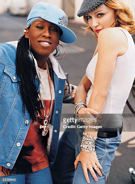 In this handout photo from The Gap, singers Madonna and Missy Elliott appear for Gap's new fall TV campaign set to "Into the Hollywood Groove," a new...