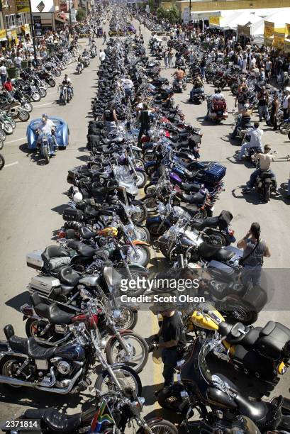 Motorcycles line the street at the annual Sturgis Motorcycle Rally August 5, 2003 in Sturgis, South Dakota. The weeklong rally attracts an estimated...