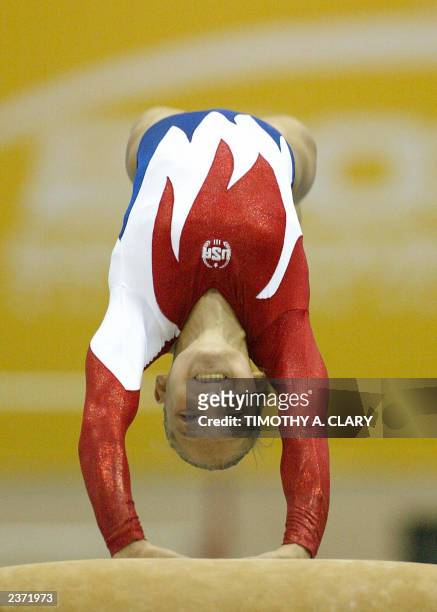 Courtney McCool performs her silver medal routine on the vault during the Women's Artistic Gymnastics Individual Apparatus Finals at the Parque Del...