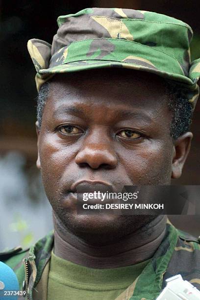 Major Fernando Pereira nicknamed Cobo, one of the putchists of Sao Tome's coup, listens to journalists' questions during a press point at the Marlin...