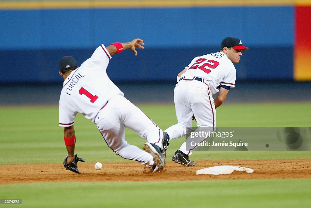 Rafael Furcal scrambles for a loose ball
