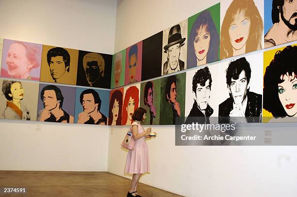 Christine "Darling" Feldman enjoys birthday cake as well as the artwork of Andy Warhol during the 75th birthday celebrations at the Andy Warhol...