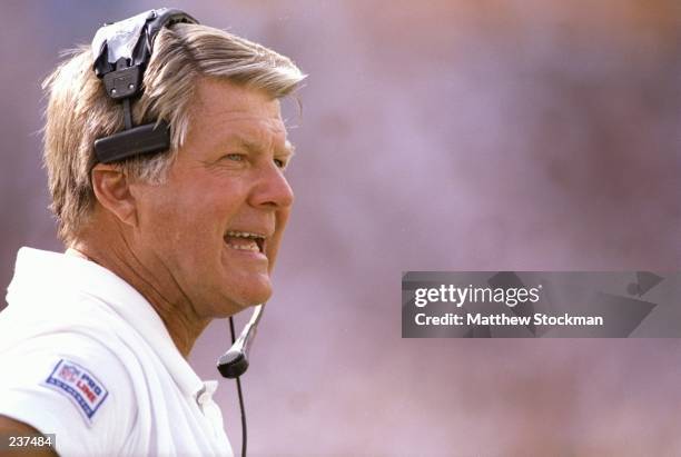 Head coach Jimmy Johnson of the Miami Dolphins looks on from the sideline during the Dolphins 24-10 victory over the New England Patriots in the...