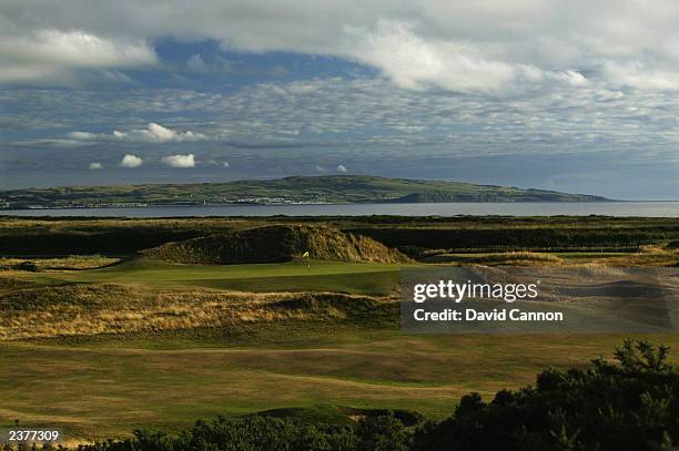 General view of the 'Postage Stamp' par 3, 8th green with the town of Ayr behind taken during a photoshoot held on July 26, 2003 at the Royal Troon...