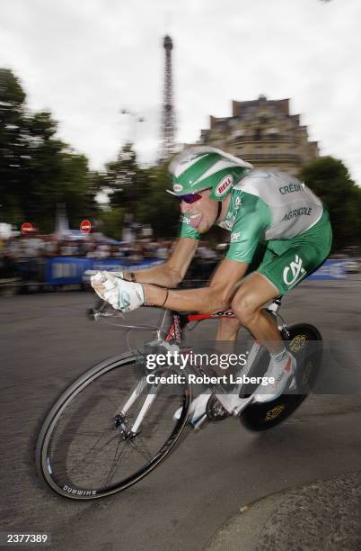 Christophe Moreau of France and team Credit Agricole races his bicycle during the 6.5 kilometer Tour de France prologue time trial in the streets of...