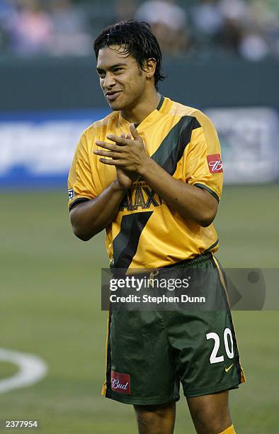 Carlos Ruiz of the Los Angeles Galaxy claps during introductions prior to their Major League Soccer game against the Columbus Crew on July 30, 2003...