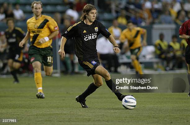 Kyle Martino of the Columbus Crew plays the ball against the Los Angeles Galaxy in their Major League Soccer game on July 30, 2003 at the Home Depot...