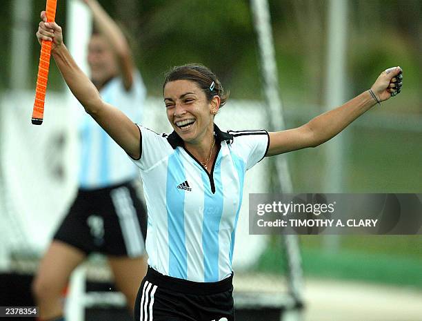 Argentina's Mariana Gonzalez celebrates her goal against Chile during the women's field hockey competition at the Parque Del Este at the XIV Pan...