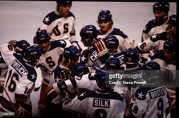 The USA Team celebrates their 4-3 victory over Russia in the semi-final of the Ice Hockey event at the 1980 Winter Olympic Games in Lake Placid, USA....