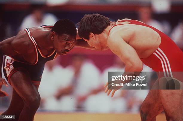 Kenneth Monday of the USA in action against Adlan Varaev of the USSR in the 74kg freestyle wrestling category at the 1988 Summer Olympics in Seoul,...