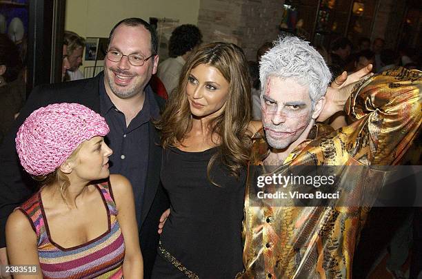 Director Eli Roth and Lions Gate Films executive Peter Block mingle with actors Jordan Ladd and Cerina Vincent at the after-party for the premiere of...