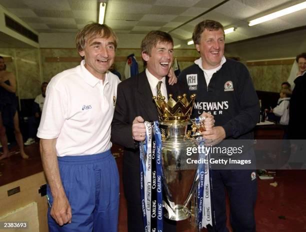 Kenny Dalglish the manager of Blackburn Rovers celebrates with his staff of Ray Harford and Tony Parkes after winning the Premiership trophy during...