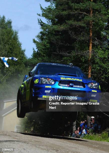 Petter Solberg of Norway drives his Subaru Impreza during the second leg of the WRC Rally of Finland on August 9, 2003 in Finland.