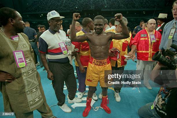 Boxer Azumah Nelson celebrates after his match with Jesse James Leija in San Antonio, Texas. Mandatory Credit: Holly Stein/ALLSPORT