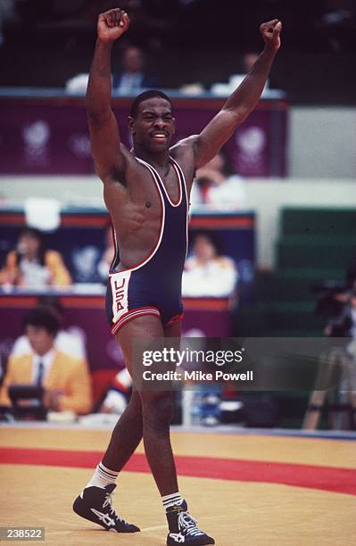 Kenneth Monday of the USA celebrates after winning the 74kg freestyle wrestling category at the 1988 Summer Olympics in Seoul, South Korea. Mandatory...